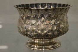 Tiffany & Co, an embossed white metal pedestal bowl.