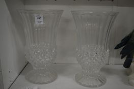 A pair of glass vases.