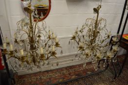 A good large pair of ormolu and cut glass twelve branch chandeliers.
