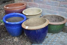 Five various glazed planters.