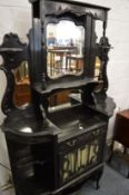 A Victorian ebonised mirror backed side cabinet.