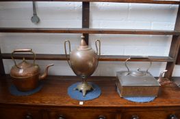 Two copper kettles and a samovar.