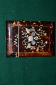 A Victorian mother of pearl inlaid tortoiseshell card case.