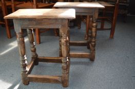 A pair of oak joint stools.