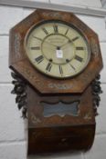 Brass inlaid Victorian wall clock.
