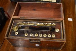 A J. Gregory boxed accordion.