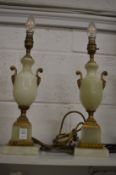 A pair of alabaster and ormolu table lamps.