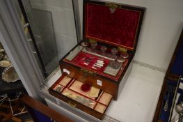 A Victorian rosewood dressing table box with fitted interior, the cut glass jars and boxes with