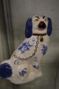 A pair of reproduction Staffordshire spaniels.