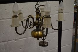 Two floral framed wall mirrors.