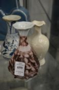 A group of three small Chinese bottle vases.