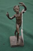 A small cast bronze model of Pan.