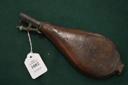 A leather shot or powder flask.
