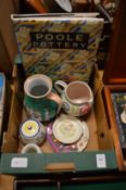 Poole pottery and other china, plus a Poole pottery book.