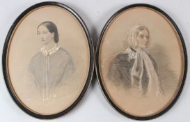 19TH CENTURY SCHOOL Pair of portraits woman and girl charcoal and coloured pencil oval frames 28 x