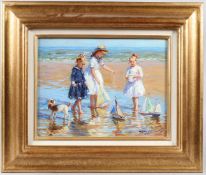 KONSTANTIN RAZUMOV (b.1974 RUSSIAN) On the seashore children playing on a beach with toy yachts