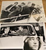 [THE BEATLES] a group of 3 large silver prints of the Beatles and one enlarged half tone