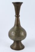 A FINE AND LARGE INDO PERSIAN ENGRAVED BRASS BOTTLE VASE. 42cms high.