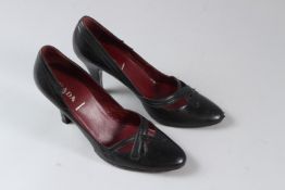 PRADA, A PAIR OF LADIES BLACK LEATHER HIGH HEEL SHOES, size 39.