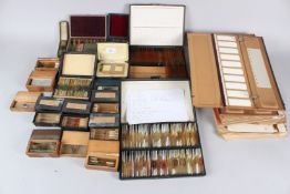 A COLLECTION OF MICROSCOPE SLIDES, in boxes and card cases.