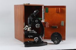 A COOKE, TROUGHTON & SIMMS LTD BINOCULAR MICROSCOPE, with mahogany case.