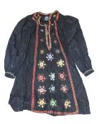 AN INDIAN EMBROIDERED DRESS. 120cms long.
