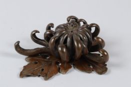 A JAPANESE OKIMONO BRONZE INCENSE HOLDER. 13cms high.