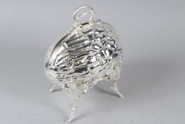 A PLATED BISCUIT WARMER in the form of a walnut. 20cms wide.