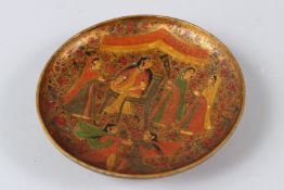 A FINE 19TH CENTURY INDIAN KASHMIRI LACQUERED PAPIER MACHE DISH depicting figural decoration.