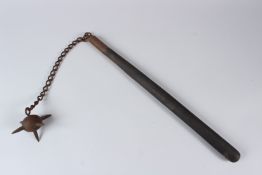 A EUROPEAN SPIKED FLAIL MACE, with wooden handle and steel chain and mace head. 90cms long overall.