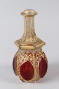 A LATE 19TH CENTURY BOHEMIAN BOTTLE FOR THE ISLAMIC MARKET, with gilded decoration and ruby tinted