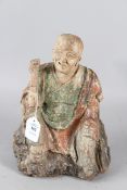 A GOOD RARE LARGE 18th CENTURY CARVED WOOD AND POLYCHROME DECORATED SEATED BUDDHA. 60cms high.