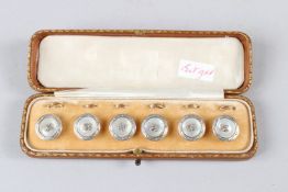 A SET OF SIX 15CT YELLOW GOLD, MOTHER OF PEARL AND DIAMOND DRESS STUDS.