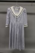 CATHERINE WALKER, FOR THE CHELSEA DESIGN CO., A PINAFORE STYLE DRESS, size medium.