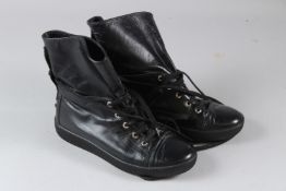CHANEL, A PAIR OF LADIES BLACK LEATHER LACE UP BOOTS, size 38.