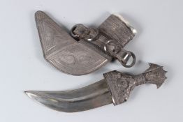 A VERY FINE EARLY 20TH CENTURY ARAB OMANI JAMBIYA SILVER DAGGER. 30cms long.