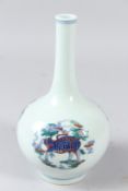 A CHINESE WUCAI PORCELAIN BOTTLE VASE, painted with a dragon, phoenix and goat. 20cms high.