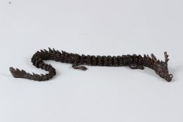 A JAPANESE BRONZE ARTICULATED DRAGON.