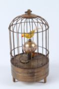 A NOVELTY BIRD CAGE CLOCK. 18cms high.