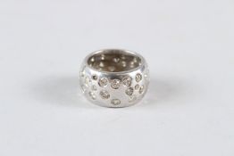 AN 18CT WHITE GOLD BAND RING, 5 CARAT OF DIAMONDS.