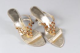 CASUCCIO & SCALERA, A PAIR OF SILVERED LEATHER HIGH HEEL SHOES with diamante decoration, size 39.