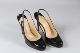 CHRISTIAN LOUBOUTIN, A PAIR OF LADIES BLACK PATENT LEATHER HIGH HEEL SHOES, size 41.