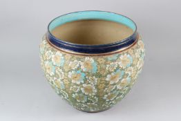 A LARGE ROYAL DOULTON SLATER'S PATENT CIRCULAR JARDINIERE, with floral decoration to the body. 33cms