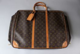 A LOUIS VUITTON HOLDALL. 50cms wide.