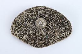 A VERY FINE 19TH CENTURY INDIAN OR SOUTH EAST ASIAN WHITE METAL BELT BUCKLE. 10cms long.