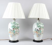 A PAIR OF 19TH CENTURY FAMILLE VERTE PORCELAIN VASE LAMPS, each decorated with female figures