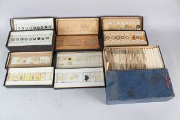 A COLLECTION OF MICROSCOPE SLIDES, boxed.