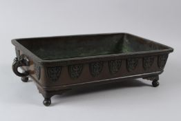 A 19TH CENTURY JAPANESE BRONZE BONZAI JARDINIERE, of rectangular form, with shield shape motifs to