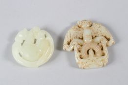 TWO CHINESE CELADON JADE PENDANTS. 7cms and 5cms.