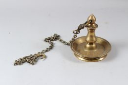 A 19TH CENTURY INDIAN BRASS CIRCULAR HANGING LAMP. Base: 14cms diameter. Length: 94cms.